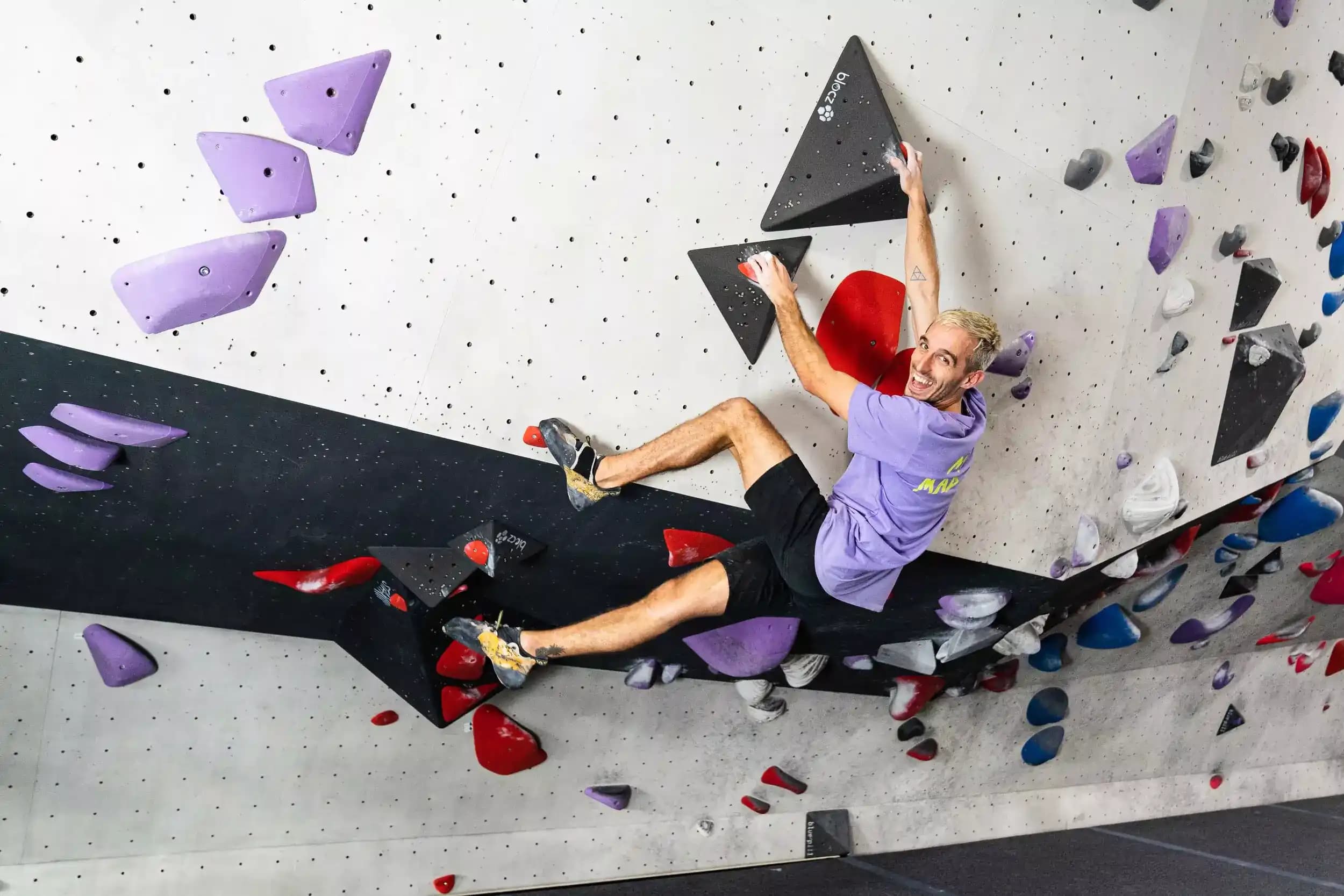 Man climbing on a red route at Lane Cove