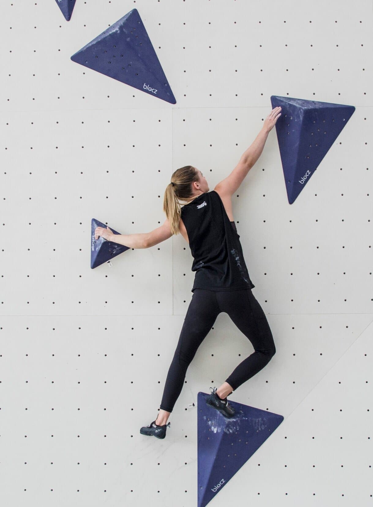 Woman climbing on volumes at Paramatta